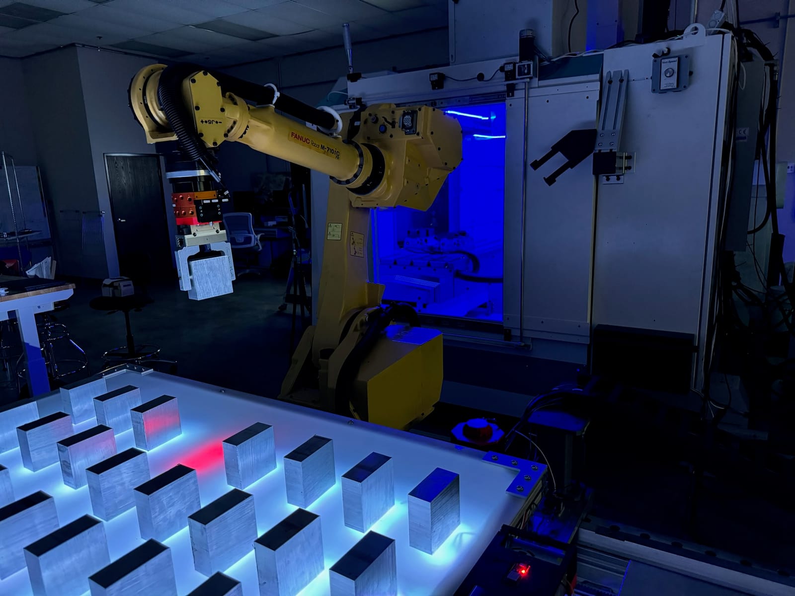 Robot cell in Avalon's automated machining factory