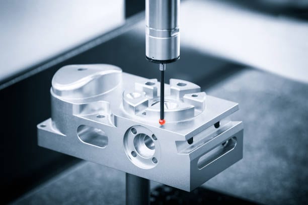Coordinate measuring machine inspecting a part