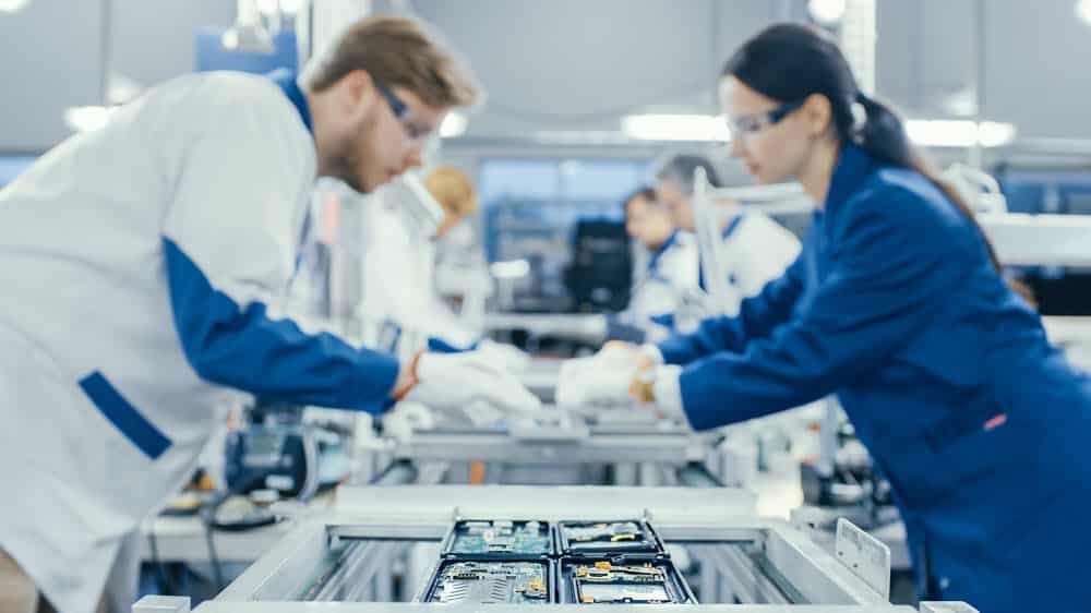 Technicians assembling components